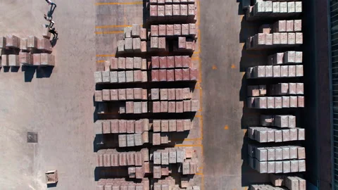 Aerial Top Down Piles of Ceramic Tiles Outside of Factory Stock Footage 166414541