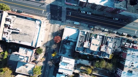 Aerial top down Prospect Heights Brooklyn roofs and roads city during fall .. Видео 284757900
