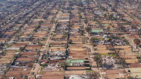 Aerial top down pullback shot of Pacific Palisades after the fire Stock Footage 308181985