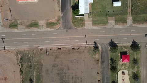 Aerial top down of remote desert town road historic route 66 midpoint Adria.. Stock Footage 321023172