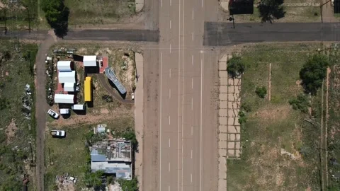 Aerial top down of remote desert town road historic route 66 midpoint Adria.. Video stock 321023221