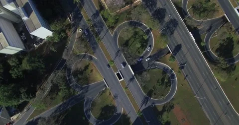 Aerial top down rotating above intersecting roads in Brasilia 스톡 동영상 63197124