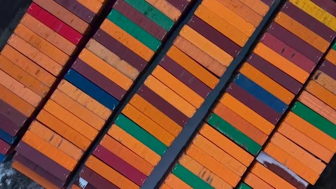 Aerial top down rotating view of colorful shipping containers Stock Footage 329659565