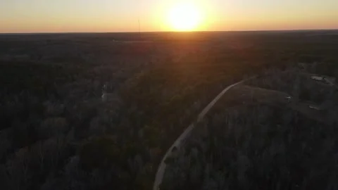 Aerial top down rural forest winter sunset after Hurricane Helene in Newton.. 動画素材 317025574