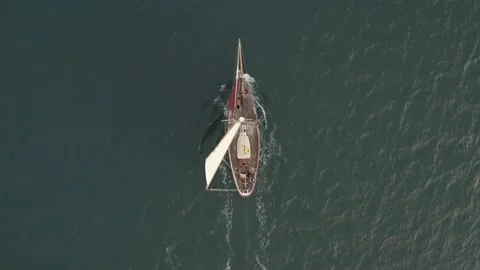 Aerial top down of ship coming out of Falmouth Harbour Stock Footage 143243444