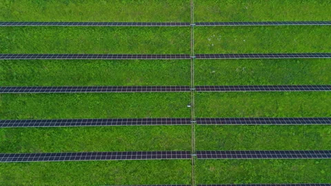 Aerial top down shoot of a large solar farm with rows of photovoltaic panels Stock Footage 340383407