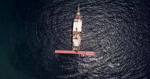 Aerial Top Down shot on attraction boat for sport activity in the dark blue Stock Footage 145534836