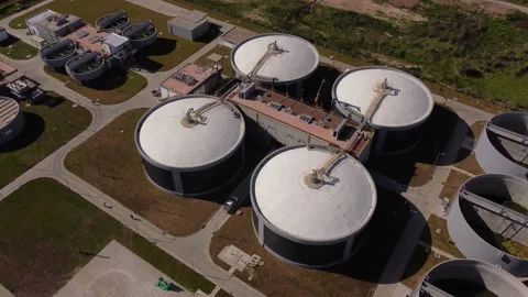 Aerial top down shot of big water tanks ... | Stock Video | Pond5