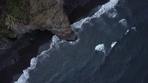 Aerial top down shot of black sand beach 스톡 동영상 163604567