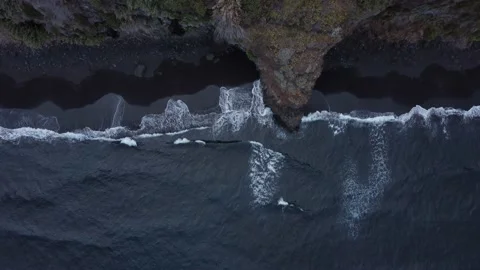 Aerial top down shot of black sand beach 스톡 동영상 163604575
