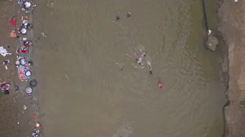Aerial top down shot of HAITIANS Populat... | Stock Video | Pond5