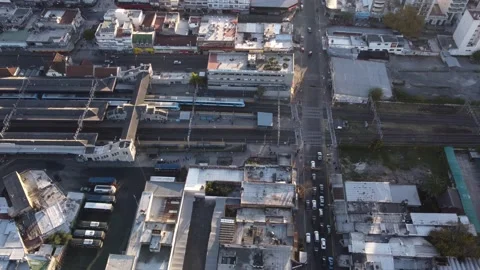 Aerial top down shot of Lomas de Zamora train station during sunset in Stock Footage 200339073