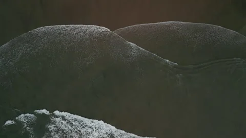 Aerial top down shot of Ocean wave roll ... | Stock Video | Pond5