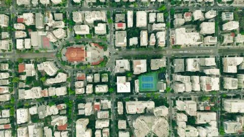 Aerial top down shot of rectangular streets and buildings pattern in Athens Stock Photos