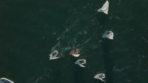 Aerial: Top down shot of small yachts racing Stock Footage 235634818