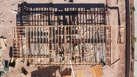 Aerial top down shot of workers building new  residential wooden homes in Vegas Stock Footage 200525556