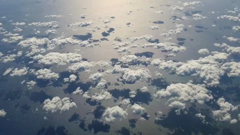 Aerial top down of small clouds reflecting on sea Vídeo Stock 277520048