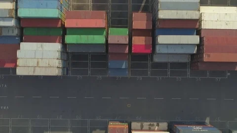 AERIAL TOP DOWN stack of cargo containers loaded with goods at industry terminal Stock Footage 81455651