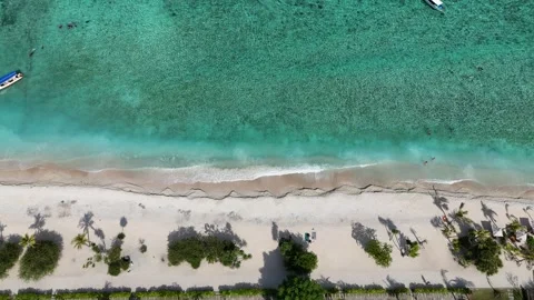 Aerial Top Down Static Shot of Gili Meno Beach Waves and Boats Indonesia Stock-Footage 330976835