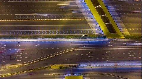 Aerial top down time lapse over expressway toll gate with many vehicles passing. Stock Footage 109061683