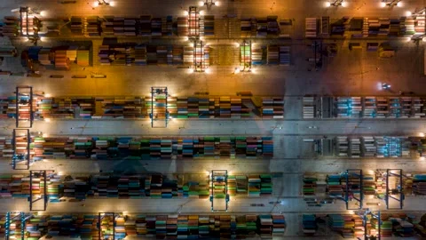 Aerial top down time lapse view of rows of cargo containers and trucks Stock-Footage 261402267