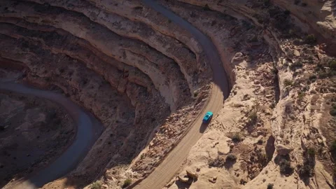 Aerial Top-Down Tracking of Car on Moki Dugway Switchbacks Utah Stock Footage 328336086