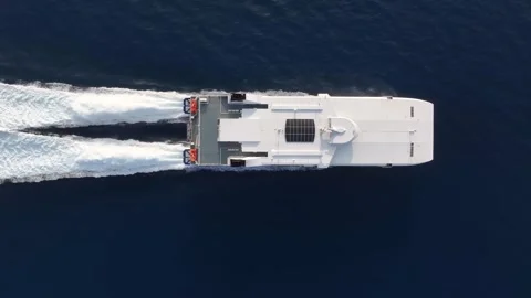 Aerial top down tracking view of a catamaran jet passenger ferry boat Stock-Footage 262070016