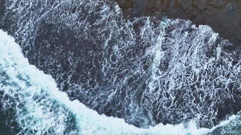 Aerial Top Down Tracking Waves Over Rocky Coast Pangandaran Vídeo Stock 332824204