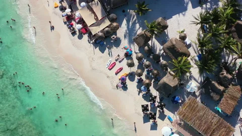 Aerial top down of tropical white sand beach at Playa Xpu Ha in Mexico on Stock Footage 220494490
