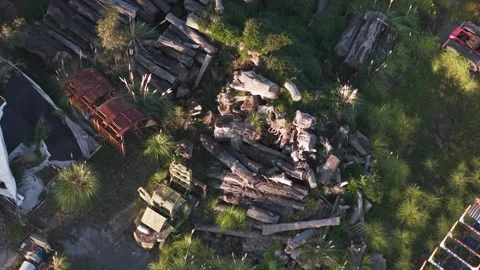 Aerial top-down view of an abandoned car graveyard Stock Footage 346385347