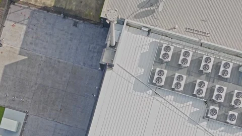 Aerial top down view of air conditioning units on a building roof Stock Footage 340594626
