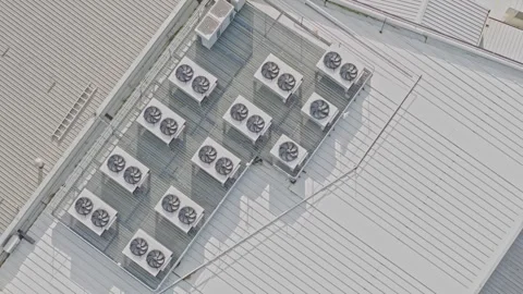 Aerial top down view of air conditioning units on a building roof Stock Footage 340594742