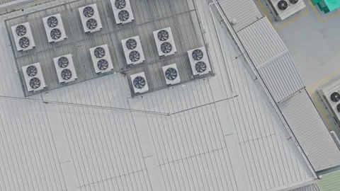 Aerial top-down view of air conditioners on a metal roof Stock Footage 340603857