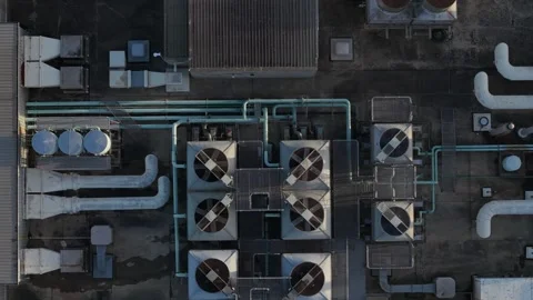 Aerial top down view of air conditioning units on a building rooftop Stock Footage 346156822