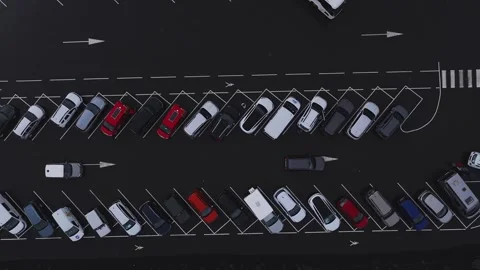 Aerial top down view of airport parking lot with cars in Iceland Stock Footage 320673514