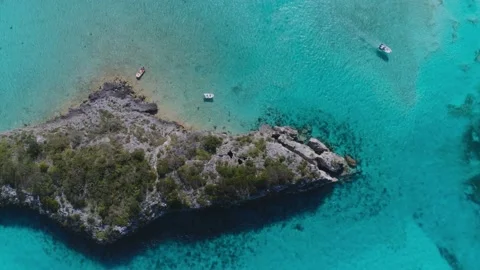 Aerial Top Down View of Bahamas secluded islands and sailboat with clear water Stock Footage 239940967