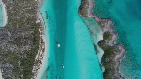 Aerial Top Down View of Bahamas secluded islands with sailboat and clear water Stock Footage 239940970