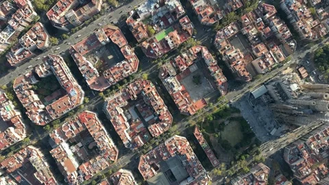 Aerial top down view of Barcelona's square block grid and La Sagrada Familia Stock Footage 279638560