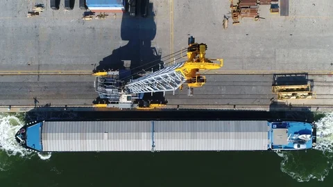 Aerial top down view of barge ready to leave dock 4k Stock Footage 110336021