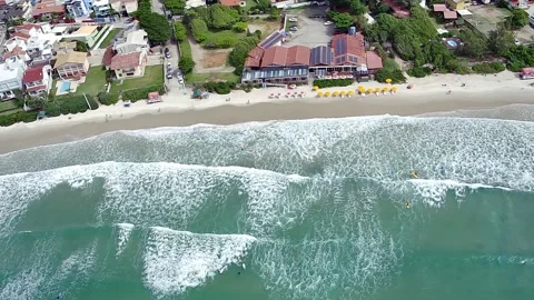 Aerial top-down view of Barra da Lagoa beach in Florianopolis. Stock Footage 314531325