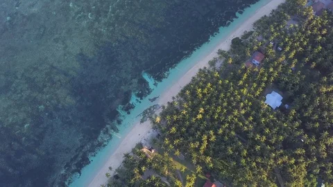 Aerial  top down view of a beach on a tropical paradise island Stock Footage 125086073