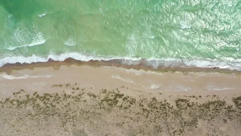 Aerial top down view of the beach without people on a hot sunny day Stock Footage 197515850