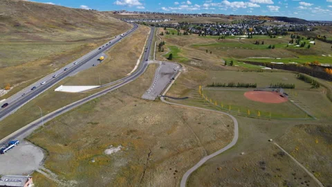Aerial top-down view of beautiful town with residential homes and highways. Stock Footage 162360318