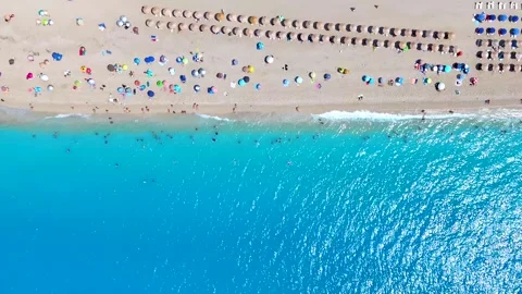 Aerial top down view of the beautiful Mylos Beach Stock Footage 294979191
