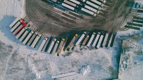 Aerial top down view: Big queue of trucks. Truck sump. HD Видео 104617567