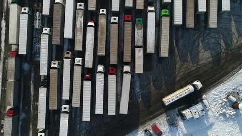 Aerial top down view: Big queue of trucks. Truck sump. HD Video stock 104617845