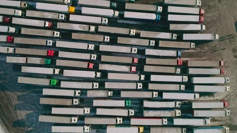 Aerial top down view: Big queue of trucks. Truck sump. HD Видео 104617870