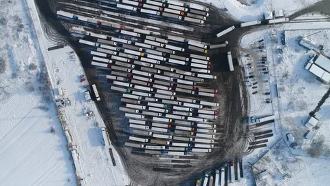 Aerial top down view: Big queue of trucks. Truck sump. HD Видео 104618138