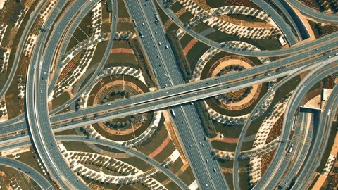 Aerial top down view of a big highway interchange traffic in Dubai, UAE Stock Footage 125705491