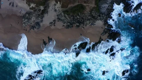 Aerial top down view of big vawes on beach Stock Footage 172436632